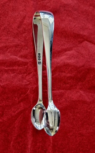 Solid silver sugar tongs - silver,